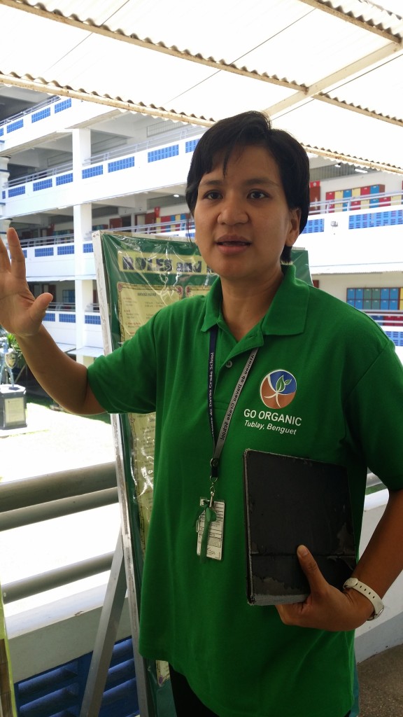 Ms. Carmela Marie M. Santos, director of Ecoteneo, explains the Ateneo de Davao initiatives to reduce carbon emission. Photo by Perry Paul G. Lamanilao.