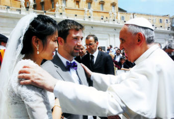 Pope Francis celebrating the marriages of 20 couples at the Vatican
