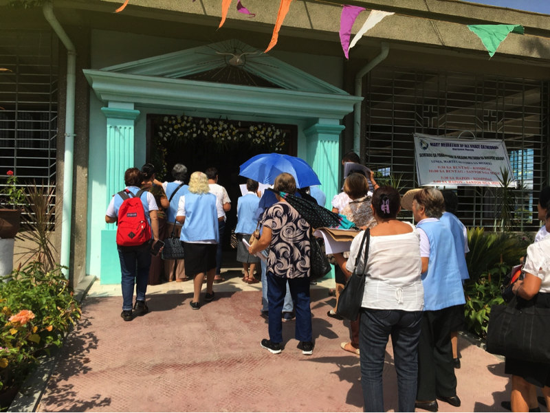 PWHS members enter the Holy Door at the Mary Mediatrix Cathedral, Digos.