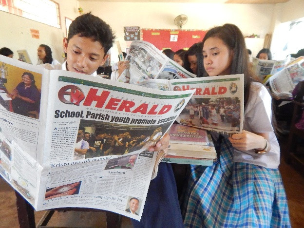 Holy Cross of Mintal subscribes to Catholic newspaper