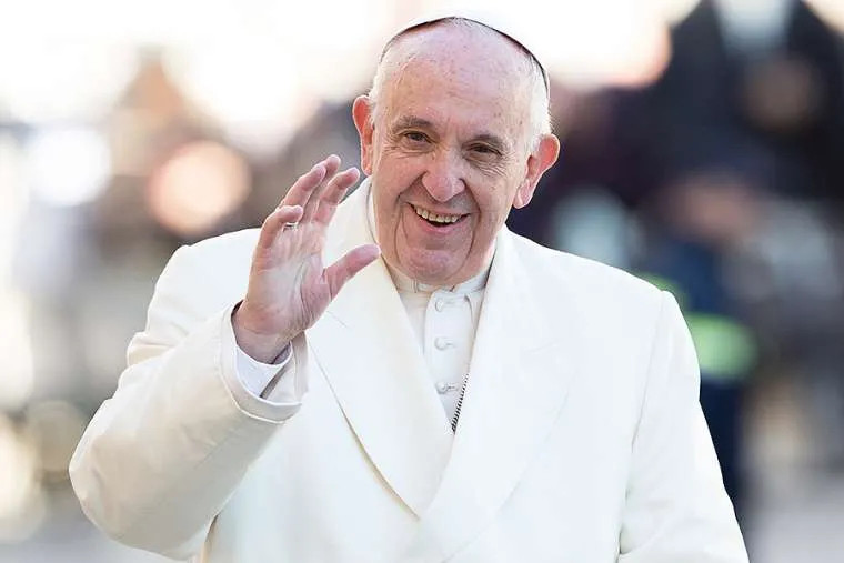 Pope Francis waves