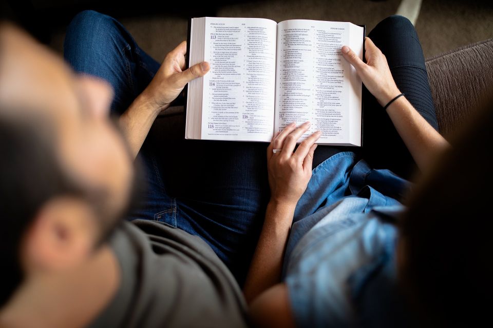 cassidy rowell unsplash stock couple reading Bible