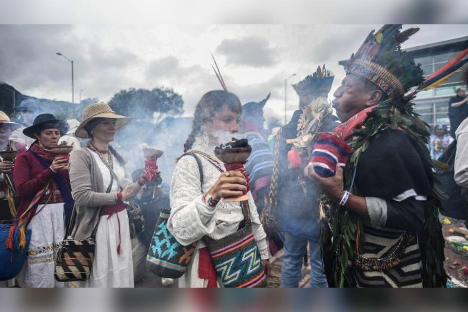 Indigenous people attend a ceremony in Colombia