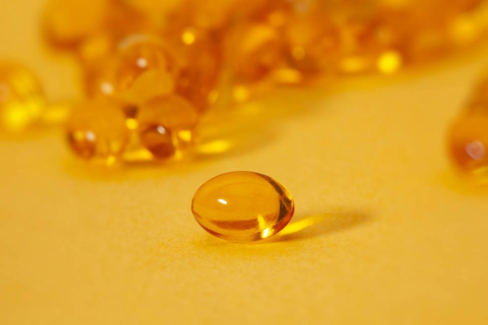 Michele Blackwell stock vitamin D capsule supplement tablet unsplash