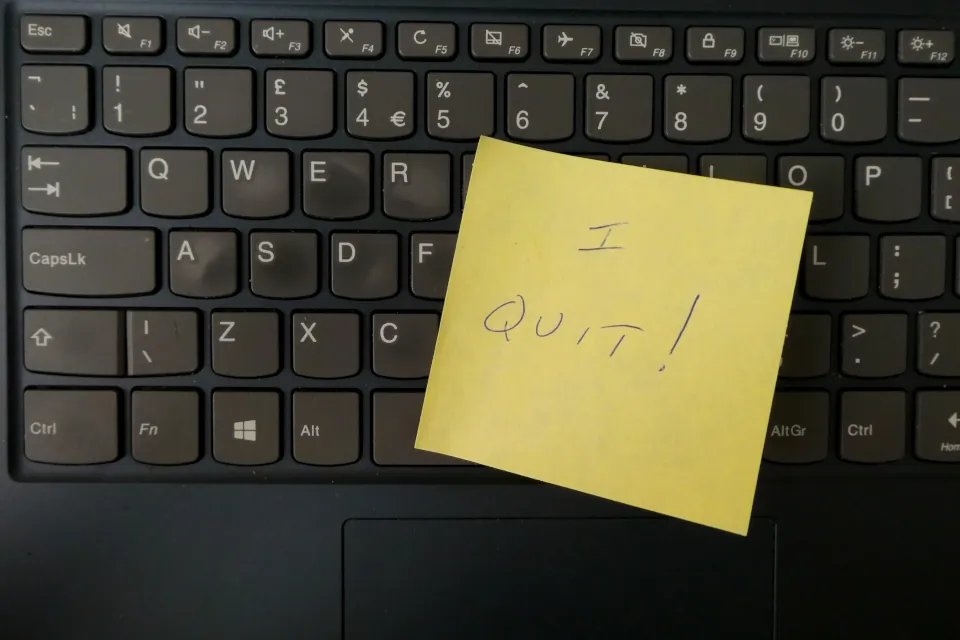 Job resignation laptop post-it stock by Nick Fewings on unsplash