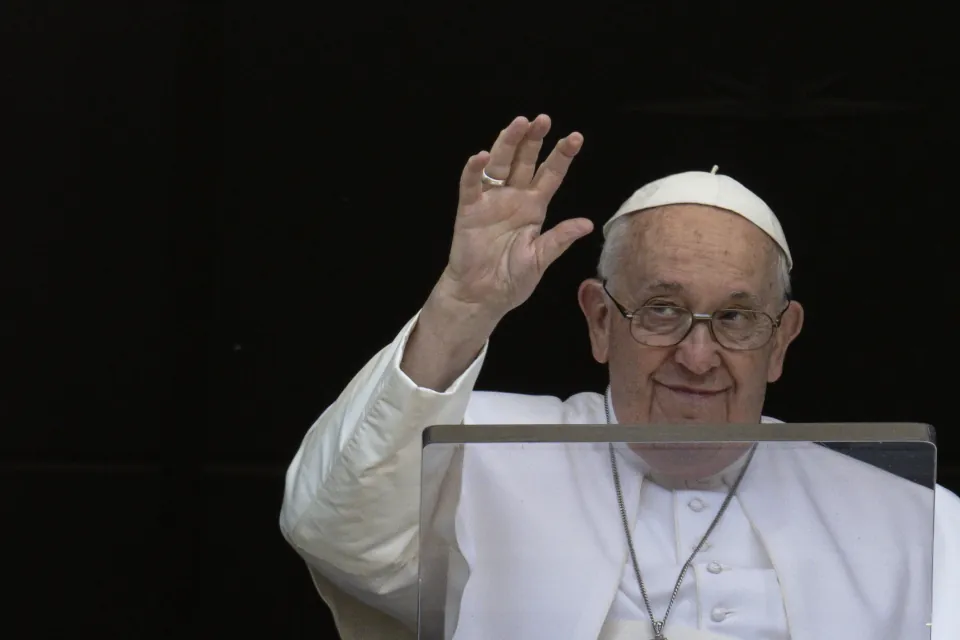 Pope Francis waves to pilgrims gathered in St. Peter's Square for the recitation of the Regina Caeli on May 7, 2023