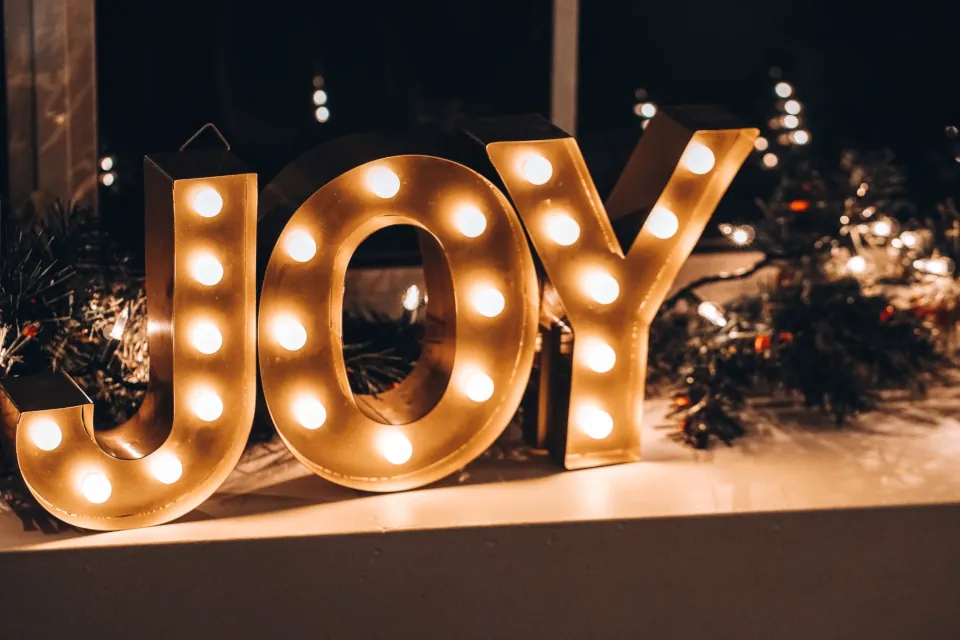 JOY spelled lights stock photo by Kolby Milton on unsplash