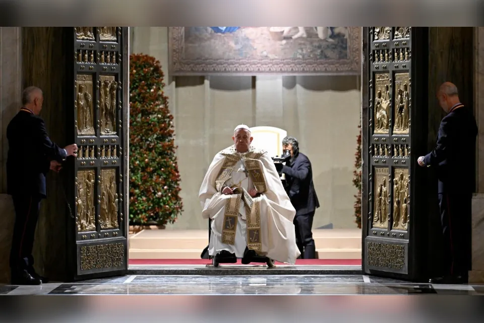 Pope Francis at the threshold of the opened Holy Door of Saint Peter's Basilica