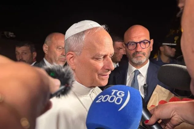 Pope Leo speaks to reporters as he leaves Castel Gandolfo on September 16, 2025