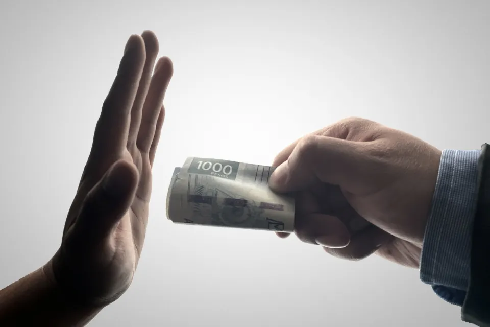 stock photo of corruption money by Jesus Monroy Lazcano on unsplash