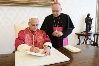Pope Leo signing the Apostolic Exhortation "Dilexi te"