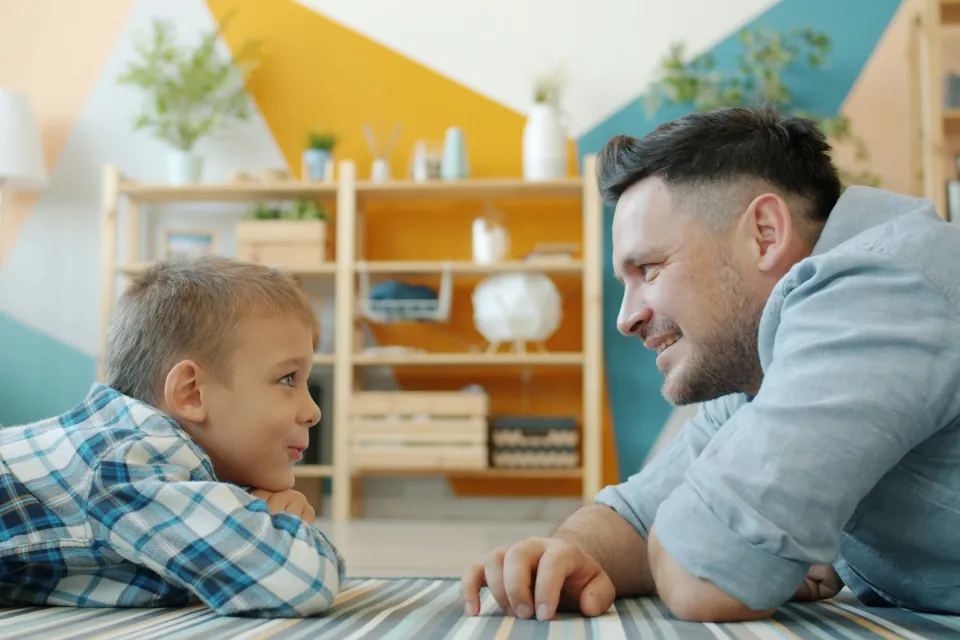 stock photo of father and son talking-communication by Vitaly Gariev on Unsplash